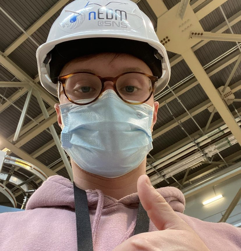 Jackson in a helmet during detector installation... safety first!